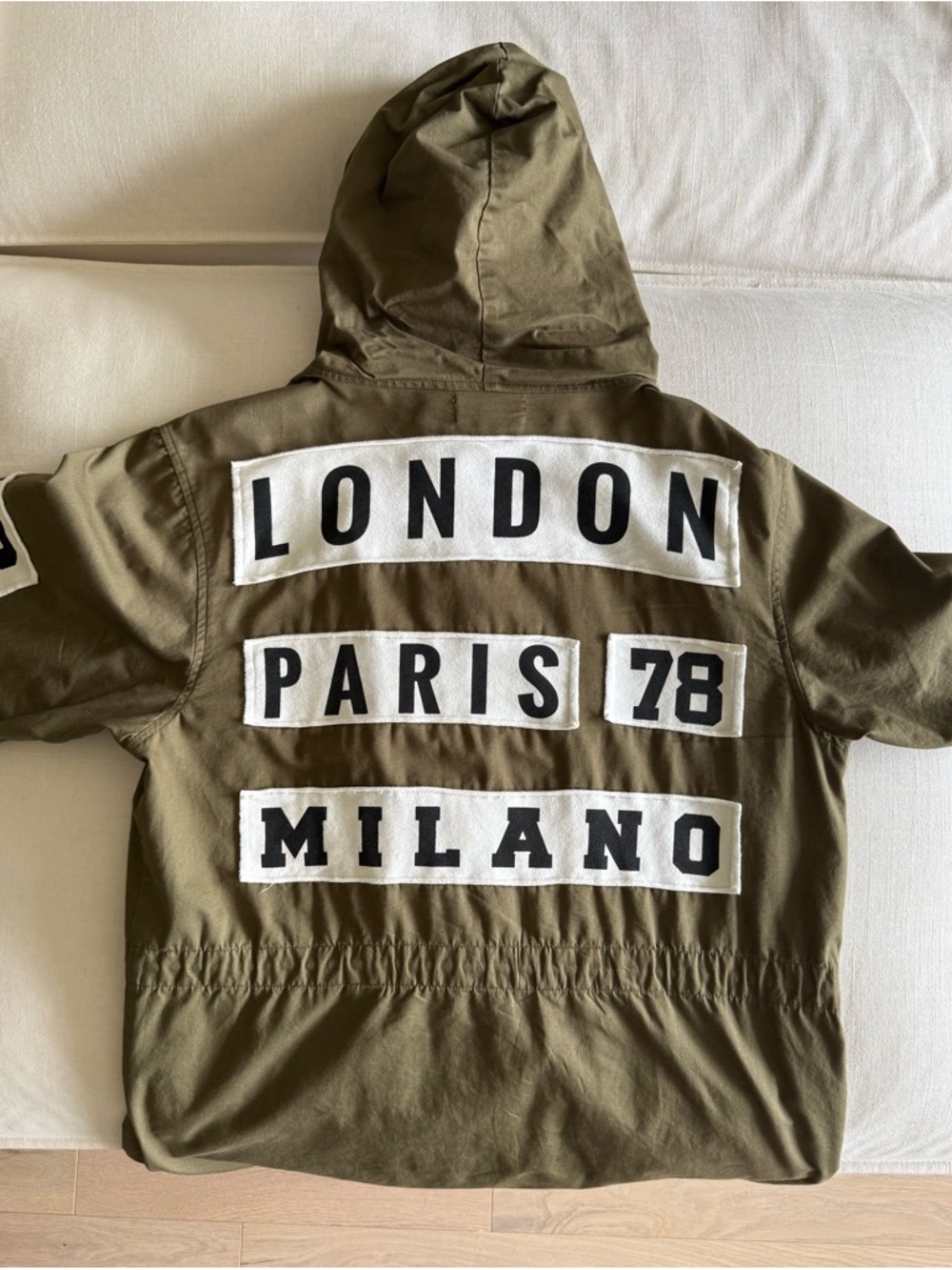 Olive City Patch Hooded Jacket with LONDON PARIS MILANO Graphics